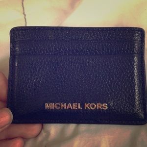 All black pebble leather Michael Kors mini wallet